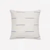 Almohadón Blaina de algodón y lino blanco con detalle bordado azul 45 x 45 cm en Azul, Blanco - Textiles, Uruguay | Kavehome, vista 1 de 4