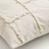 Almohadón Verion con detalle geométrico bordado amarillo 45 x 45 cm en Amarillo - Textiles, Uruguay | Kavehome, vista 4 de 4