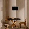 Mesa redonda Argo de cristal negro mate y patas de acero efecto madera Ø 150 cm en Negro - Mesas de comedor, Uruguay | Kavehome, vista 2 de 6