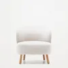 Butaca Ulit de chenilla - beige y patas de madera maciza haya acabado natural en Beige - Butacas, banquetas y puffs, Uruguay | Kavehome, vista 7 de 10