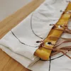 Chal maíz y crudo con cuero - Textiles, Uruguay | Dreams On Time, vista 1 de 6