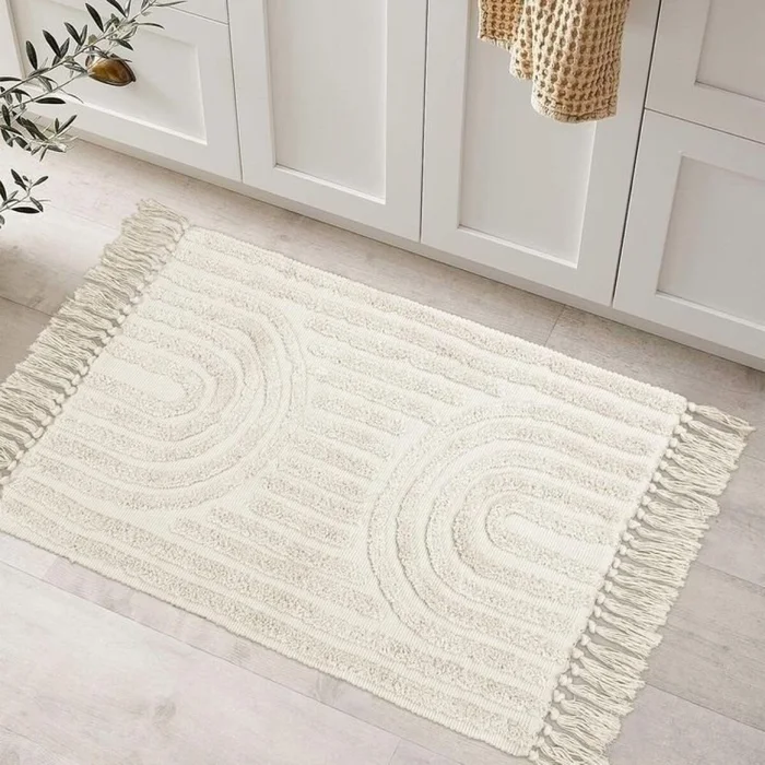 ALFOMBRA FLEECE C/FLECOS 50X80CM SEMICIRULOS en Beige - Alfombras, Uruguay | Decohogar, vista 3