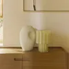 Jarrón Cristila de vidrio amarillo 25 cm en Amarillo - Jarrones, Uruguay | Kavehome, vista 2 de 7