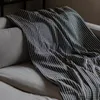 Manta para sillón y cama algodón Grafito - 130cm - Textiles, Uruguay | Buho Store, vista 6 de 6