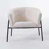 Poltrona curva - Tapizada PU camel - Asiento tela clara en Beige - Butacas, banquetas y puffs, Uruguay | Champagne Home, vista 2 de 2
