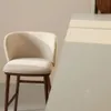 Taburete Ciselia chenilla beige y patas de madera maciza fresno acabado tono nogal FSC Mix Credit 65cm en Beige - Butacas, banquetas y puffs, Uruguay | Kavehome, vista 3 de 8