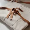 Delantal con cuero - Textiles, Uruguay | Dreams On Time, vista 1 de 4