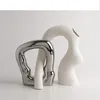 DUO DE CERAMICA PLATEADO Y BLANCO en Multicolor - Jarrones, Uruguay | Champagne Home, vista 1 de 2