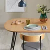 Mesa extensible Novac 170 (320) x 100 cm chapa de roble patas de acero acabado negro en Natural, Negro - Mesas de comedor, Uruguay | Kavehome, vista 2 de 9