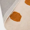Alfombra Tandani de algodón beige con diseño de guepardo naranja 90 x 150 cm en Beige - Textiles, Uruguay | Kavehome, vista 5 de 5