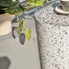 Reposapiés exterior Jenell terrazo - blanco Ø 35 cm en Blanco - Mesas de arrimo, Uruguay | Kavehome, vista 4 de 6