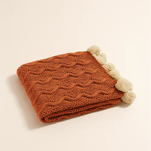 Manta Brick Pompones en Terracota - Textiles, Uruguay | Cabana