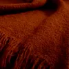 Manta Salion mezcla de lana efecto bouclé terracota 130 x 170 cm en Rojo - Textiles, Uruguay | Kavehome, vista 2 de 4