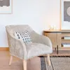 Butaca Bobly de chenilla beige y patas de madera acabado natural en Beige - Butacas, banquetas y puffs, Uruguay | Kavehome, vista 2 de 9
