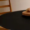 Mesa redonda Argo de cristal negro mate y patas de acero efecto madera Ø 150 cm en Negro - Mesas de comedor, Uruguay | Kavehome, vista 3 de 6