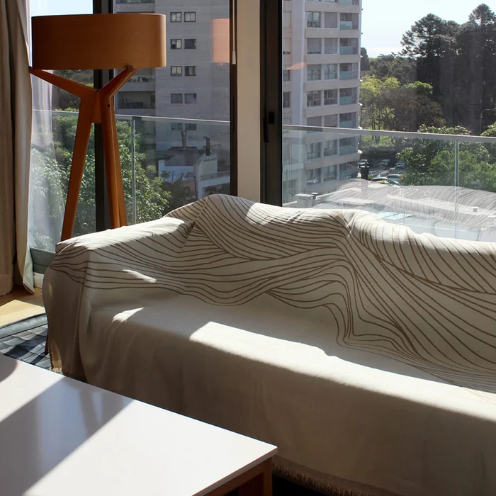 Manta para sillón y cama con diseños marrón - 180 x 280 cm en Diseños - Textiles, Uruguay | Buho Store