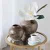 FLORERO GRANDE 20x20x19CM CERAMICA DORADO en Dorado - Jarrones, Uruguay | Koz, vista 2 de 4