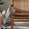 Butaca Grignoon de madera maciza de acacia y ratán sintético trenzado en Beige, Natural - Butacas, banquetas y puffs, Uruguay | Kavehome, vista 3 de 8