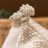 Funda de Almohadón Rombos Texturado y Borlas - Textiles, Uruguay | Arredo, vista 4 de 4