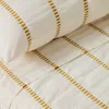 Set Lidala de 2 almohadones 100% algodón jacquard rayas mostaza 50 x 50 cm en Beige - Textiles, Uruguay | Kavehome, vista 2 de 3