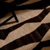 Alfombra Elvar de lana blanco y marrón 160 x 230 cm en Marrón - Textiles, Uruguay | Kavehome, vista 2 de 4