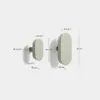 Set Arely de 2 colgadores de madera maciza de haya con acabado lacado verde 6,5 cm / 10 cm en Verde - Percheros y colgadores, Uruguay | Kavehome, vista 5 de 5