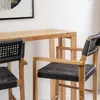 Banqueta en teca y fibra loom negra en Negro - Butacas, banquetas y puffs, Uruguay | Entrecasa, vista 7 de 9