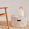 Mesa de centro redonda exterior Jenell terrazo blanco Ø 52 cm en Blanco - Mesas de living, Uruguay | Kavehome, vista 2 de 7