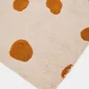 Alfombra Tandani de algodón beige con diseño de guepardo naranja 90 x 150 cm en Beige - Textiles, Uruguay | Kavehome, vista 4 de 5