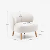 Butaca Ulit de chenilla - beige y patas de madera maciza haya acabado natural en Beige - Butacas, banquetas y puffs, Uruguay | Kavehome, vista 10 de 10
