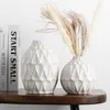 FLORERO CERÁMICA GOTA BEIGE en Beige - Jarrones, Uruguay | Champagne Home, vista 1 de 2