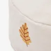 Puf Yanil 100% algodón blanco con bordado de hojas multicolor Ø 40 cm en Multicolor - Butacas, banquetas y puffs, Uruguay | Kavehome, vista 4 de 5