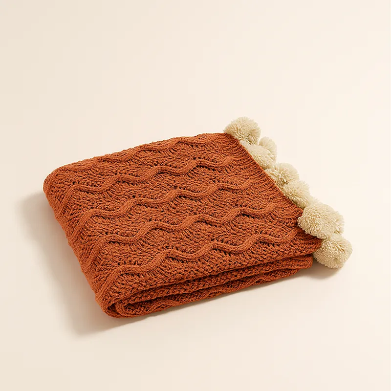 Manta Brick Pompones en Terracota - Textiles, Uruguay | Cabana