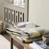 Manta throw acolchada DUNHAVRE 140x200 patchwork mix en Multicolor - Textiles, Uruguay | JYSK, vista 2 de 2