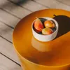 Mesa auxiliar exterior Mesquida de cerámica con acabado mostaza glaseado Ø 45 cm en Mostaza, Naranja - Mesas de arrimo, Uruguay | Kavehome, vista 3 de 6