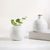 FLORERO DE RED CIRCULAR CERAMICA 9.5x9.5x8CM NATURAL en Madera natural - Jarrones, Uruguay | Koz, vista 2 de 3