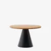 Mesa redonda Wilshire de madera maciza de acacia y patas de acero acabado negro Ø 120 cm en Multicolor - Mesas de comedor, Uruguay | Kavehome, vista 1 de 5