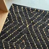 ALFOMBRA NEGRA YUTE CON ROMBOS NATURAL en Negro - Textiles, Uruguay | Masinfinito Casa, vista 1 de 2