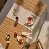 Mesa extensible de exterior Canyelles de polimadera y aluminio - blanco mate 140 (200) x 90 cm en Blanco, Marrón - Mesas de comedor, Uruguay | Kavehome, vista 3 de 7