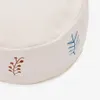 Puf Yanil 100% algodón blanco con bordado de hojas multicolor Ø 40 cm en Multicolor - Butacas, banquetas y puffs, Uruguay | Kavehome, vista 5 de 5