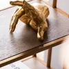 SUJETALIBRO FINGERS Bronce  - Decoración, Uruguay | Viasono, vista 2 de 5