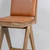 Banqueta en madera teca y cuero en Beige - Butacas, banquetas y puffs, Uruguay | Entrecasa, vista 5 de 5