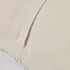 Almohadón Aima beige y blanco - 45 x 45 cm en Blanco - Textiles, Uruguay | Kavehome, vista 7 de 7