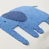 Almohadón Tandani de algodón beige con elefante bordado azul 30 x 50 cm en Blanco - Textiles, Uruguay | Kavehome, vista 4 de 4