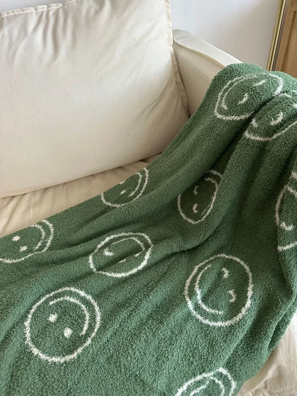 Manta Suave Caritas en Verde - Textiles, Uruguay | Cabana, vista 3