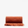 Manta Salion mezcla de lana efecto bouclé terracota 130 x 170 cm en Rojo - Textiles, Uruguay | Kavehome, vista 1 de 4
